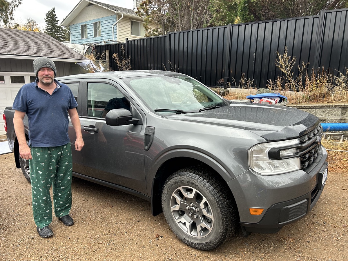 GetGoing customer with their new vehicle